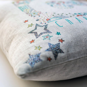 personalised new baby or christening cushion with stars, moons & glitter