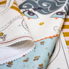 soft doll & doll's dress sewing kit in teal blue with printed toy pattern