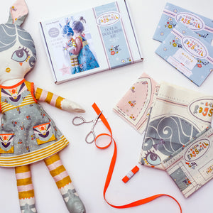 soft doll & doll's dress sewing kit in teal blue with printed toy pattern