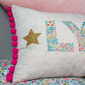 personalised floral & glitter stars name cushion with pompoms for baby & child