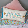 personalised floral & glitter stars name cushion with pompoms for baby & child