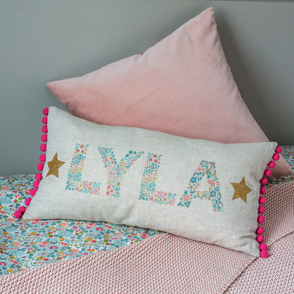 personalised floral & glitter stars name cushion with pompoms for baby & child